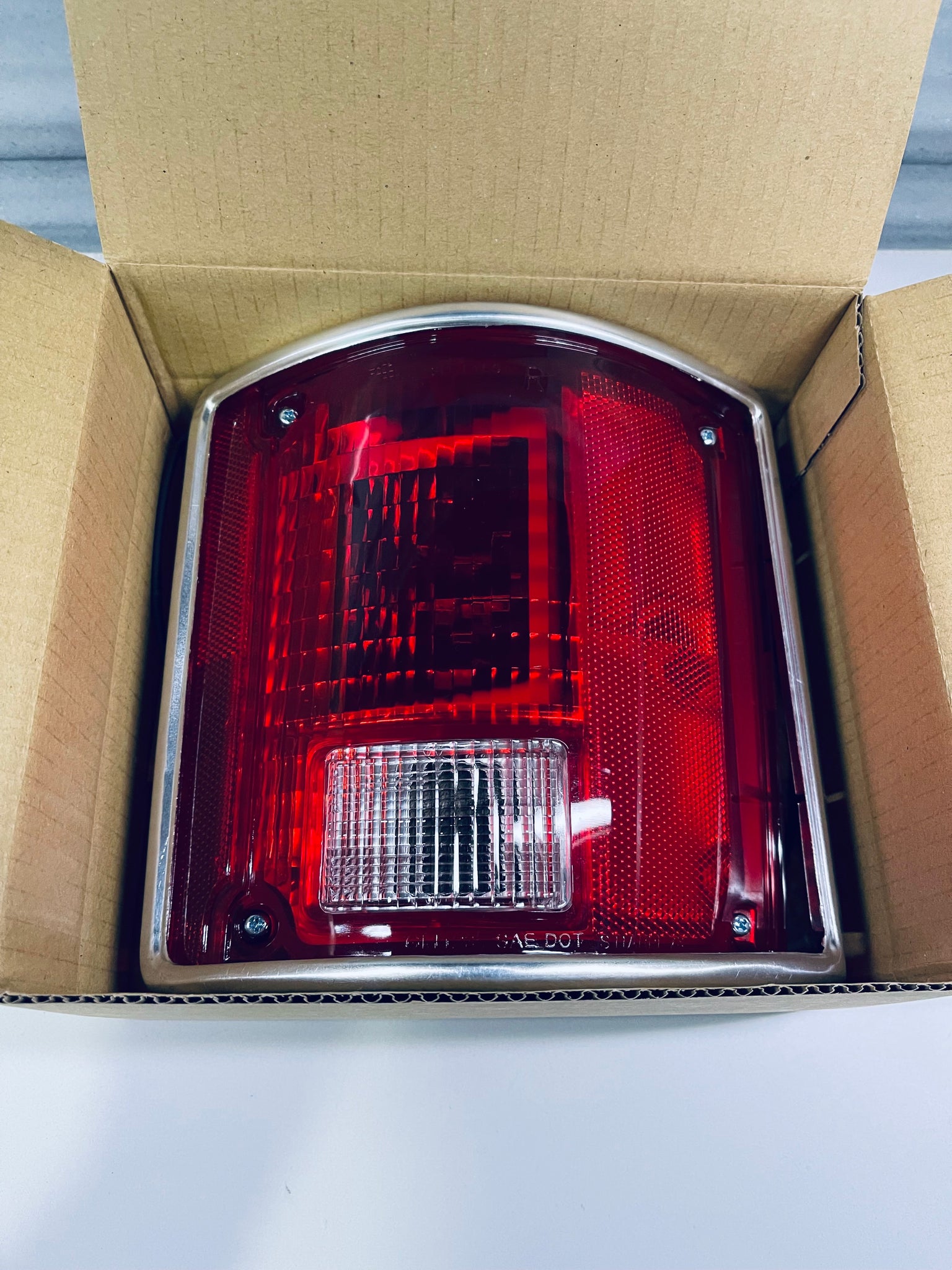 thumbnail image 2 of United Pacific Left Side Sequential LED Tail Light For 73-87 Chevy GMC Truck - Black Housing, Red Lens 2 of 3